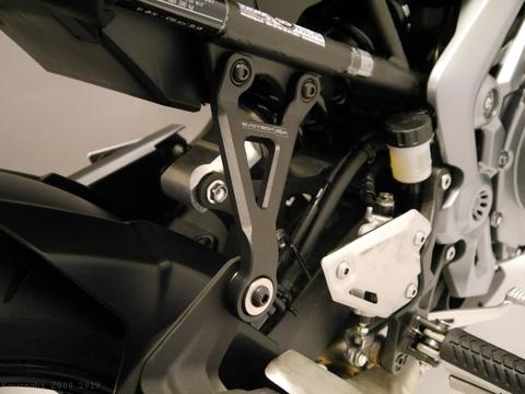 Exhaust Hanger Bracket with Passenger Peg Blockoff by